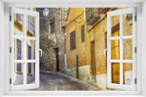 Fototapeta Naklejka Na Ścianę Okno 3D - old narrow medieval streets of the resort town of Toledo, Spain