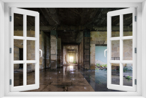 Fototapeta Naklejka Na Ścianę Okno 3D - Inside of flooded dirty abandoned ruined industrial building with water reflection