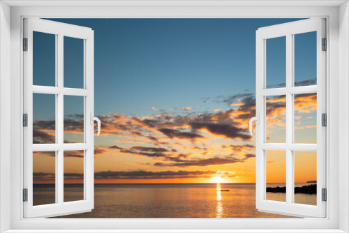 Fototapeta Naklejka Na Ścianę Okno 3D - Idyllic view of ocean sunset. Reflection of golden sundown on the sea water. Relax seascape with copy space. Concept of summer, travel and calmness