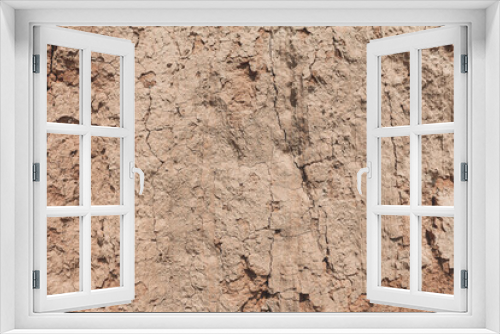 Fototapeta Naklejka Na Ścianę Okno 3D - Abstract background. Clay sandy soil. Organic texture of the ground on the sea coast, close up.