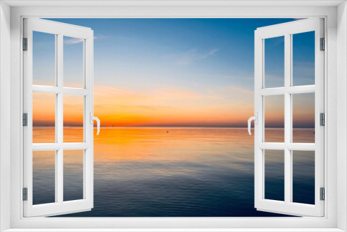 Fototapeta Naklejka Na Ścianę Okno 3D - Orange sea horizon, evening seascape background, natural colors, calm water surface reflection
