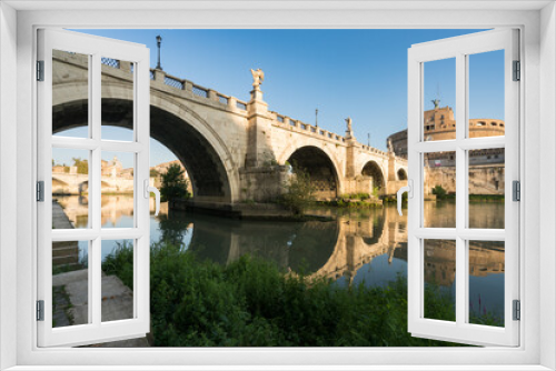 Fototapeta Naklejka Na Ścianę Okno 3D - Saint Angel Castle and bridge seen from Tiber river canal in Rome. Italy