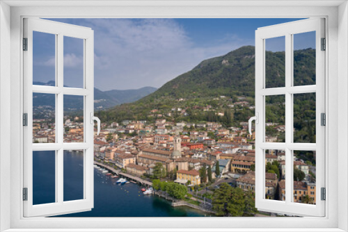 Fototapeta Naklejka Na Ścianę Okno 3D - Lake in the mountains of Italy. Aerial view of the town on Lake Garda. View of the historic part of Salò on Lake Garda Italy. Tourist site on Lake Garda.