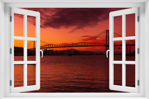 Fototapeta Naklejka Na Ścianę Okno 3D - Hercilio luz bridge and warm sunset with colorful sky in Florianopolis