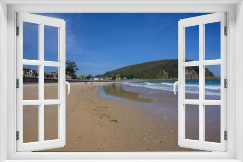 Fototapeta Naklejka Na Ścianę Okno 3D - View on Playa de Ribadesella, Green coast of Asturias, North Spain with sandy beaches, cliffs, hidden caves, green fields and mountains.