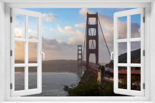 Fototapeta Naklejka Na Ścianę Okno 3D - Photograph of the fabulous Golden Gate Bridge seen from one of the viewpoints of the road that crosses the bridge. The fabulous landmark of the Californian city of San Francisco. USA concept.