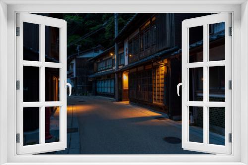 Fototapeta Naklejka Na Ścianę Okno 3D - Night view of  street with traditional boathouses at Ine Town in Kyoto, Japan.