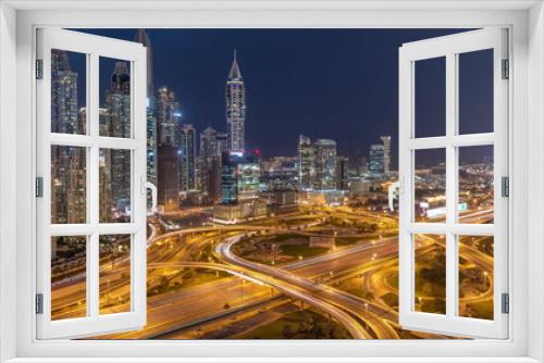 Fototapeta Naklejka Na Ścianę Okno 3D - Dubai Marina highway intersection spaghetti junction day to night timelapse