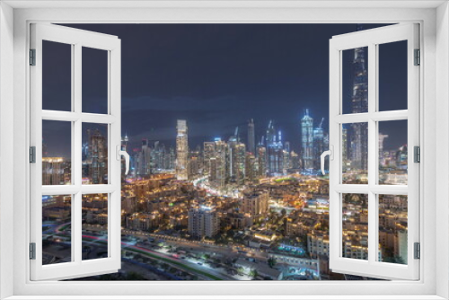 Fototapeta Naklejka Na Ścianę Okno 3D - Dubai Downtown day to night transition timelapse with tallest skyscraper and other towers