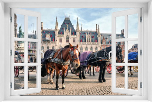 Fototapeta Naklejka Na Ścianę Okno 3D - Horses on Grote Markt Brugge, the main attraction of Bruges, Belgium