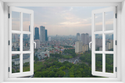 Fototapeta Naklejka Na Ścianę Okno 3D - Aerial view of Hanoi Downtown Skyline with green garden park, Vietnam. Financial district and business centers in smart urban city in Asia. Skyscraper and high-rise buildings.