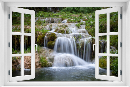 Fototapeta Naklejka Na Ścianę Okno 3D - Waterfalls of the source of the Cuervo River in the Serrania de Cuenca natural park in Cuenca, Spain