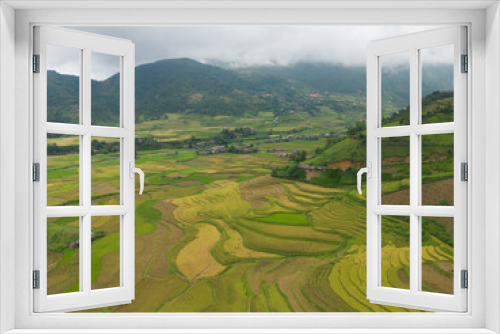 Fototapeta Naklejka Na Ścianę Okno 3D - Aerial top view of fresh paddy rice terraces, green agricultural fields in countryside or rural area of Mu Cang Chai, mountain hills valley in Asia, Vietnam. Nature landscape background.