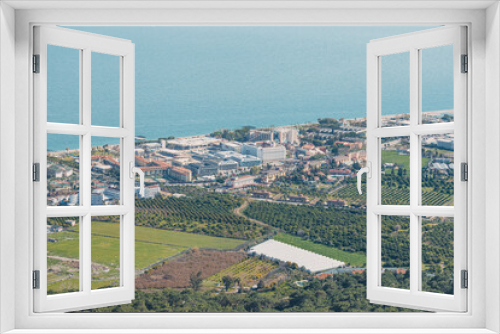 Panoramic cityscape view of Antalya resort town and mediterranean sea in the background