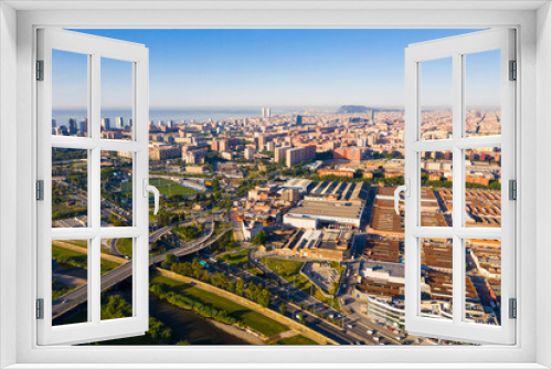 Fototapeta Naklejka Na Ścianę Okno 3D - Aerial panoramic view of Sant Adria de Besos and Barcelona on Besos river with Mediterranean sea in background on sunny day, Spain