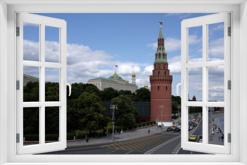 View of the architectural ensemble of the Moscow Kremlin from the bridge on a fine day.