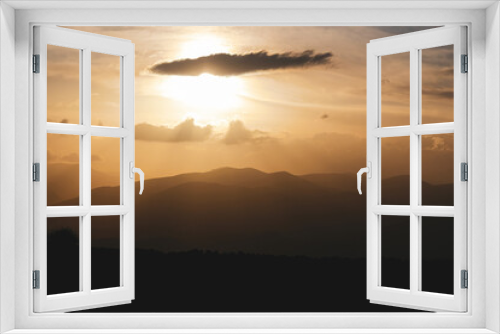 Fototapeta Naklejka Na Ścianę Okno 3D - Sunset landscape with scenic mountains view