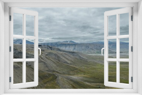 Fototapeta Naklejka Na Ścianę Okno 3D - Beautiful shot of a landscape with mountains during the day in Svalbard, Norway
