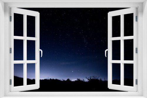 Fototapeta Naklejka Na Ścianę Okno 3D - Mesmerizing view of the starry night sky