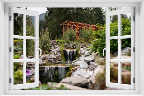 Fototapeta Naklejka Na Ścianę Okno 3D - Enchanting Cascade of Time Garden in Banff, Canada
