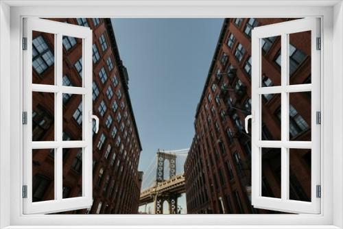 Fototapeta Naklejka Na Ścianę Okno 3D - Beautiful shot of the Brooklyn Bridge of New York City, USA on a sunny day