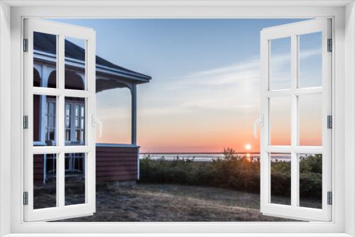 Fototapeta Naklejka Na Ścianę Okno 3D - Sunrise over the sea, view to the woden corner of a veranda