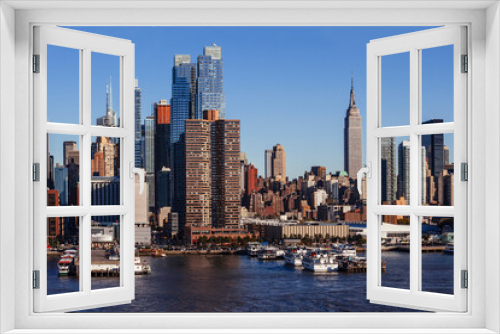 Fototapeta Naklejka Na Ścianę Okno 3D - Photo of midtown Manhattan cityscape in New York city, taken from a ferry on the Hudson.