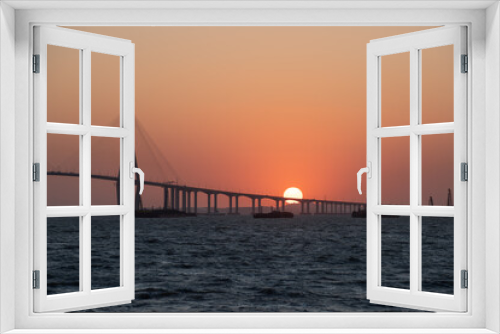 Fototapeta Naklejka Na Ścianę Okno 3D - bridge and sunset over the sea
