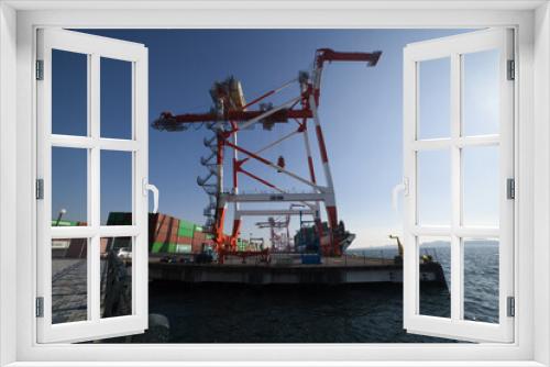 Fototapeta Naklejka Na Ścianę Okno 3D - Containers and cranes near the port in Aomi Tokyo wide shot