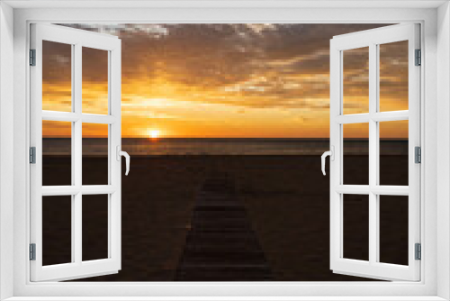 Fototapeta Naklejka Na Ścianę Okno 3D - Paisaje de amanecer en la playa