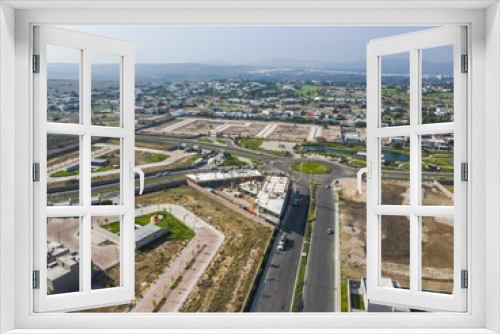 Aerial view of construction site with crane and building. Top view of big development construction and architecture.