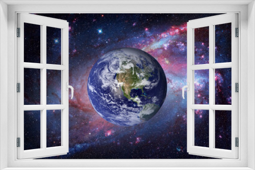Fototapeta Naklejka Na Ścianę Okno 3D - Earth and galaxy on background. Elements of this image furnished by NASA.