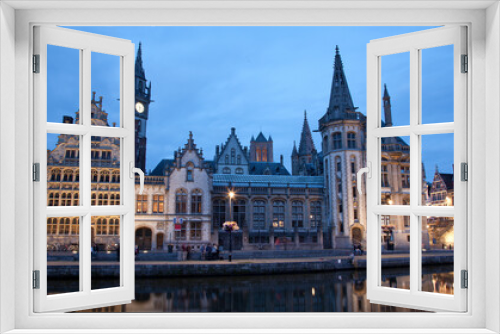 Fototapeta Naklejka Na Ścianę Okno 3D - Ghent - West facade of Post palace with the canal in evening and Korenlei street 
