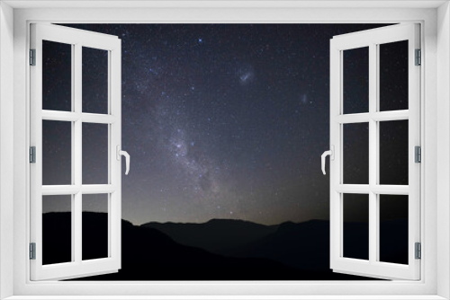 Fototapeta Naklejka Na Ścianę Okno 3D - night sky over mountain silhouette 