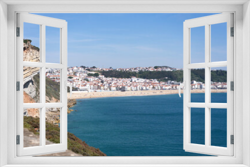 Fototapeta Naklejka Na Ścianę Okno 3D - View from above from a cliff on the coast of the Atlantic Ocean near the city of Nazare in Portugal