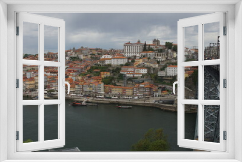 The City of the Porto (Oporto), the second largest city in Portugal located on the River Douro, with barges carrying Port (fortified wine)