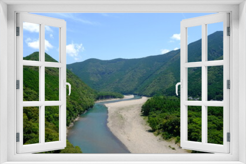 Fototapeta Naklejka Na Ścianę Okno 3D - 川と山と空の風景
