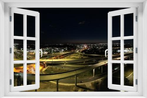 Fototapeta Naklejka Na Ścianę Okno 3D - Panorama of a highway interchange at dusk.