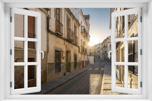 Fototapeta Naklejka Na Ścianę Okno 3D - Montefrio Street at sunrise - Montefrio, Andalusia, Spain