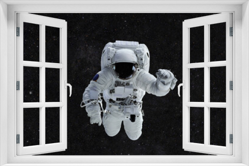 Fototapeta Naklejka Na Ścianę Okno 3D - Spaceman travels on a background of stars. Astronaut outer space