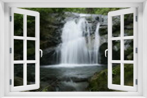 Fototapeta Naklejka Na Ścianę Okno 3D - Waterfall deep in the mountains