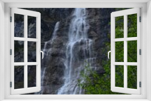 Fototapeta Naklejka Na Ścianę Okno 3D - Low angle view of beautiful waterfall in mountains