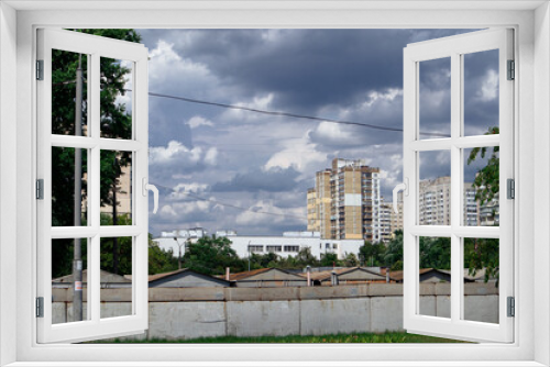 Fototapeta Naklejka Na Ścianę Okno 3D - View of the city of Kyiv under heavy gray clouds