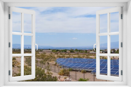 Fototapeta Naklejka Na Ścianę Okno 3D - Harnessing Solar Energy: Time-Lapse of Solar Panels near Lake Mead, Nevada, Embracing Renewable Power in 4K Resolution