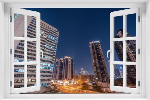 Fototapeta Naklejka Na Ścianę Okno 3D - Aerial panoramic view to Dubai downtown and difc skyscrapers day to night timelapse.