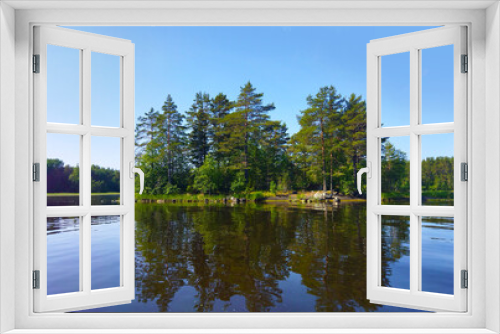 Fototapeta Naklejka Na Ścianę Okno 3D - Beautiful summer nature of northern lake. Landscape with rocky coast, green trees, blue sky and reflection in calm water. Ladoga lake, Karelia, Russia.