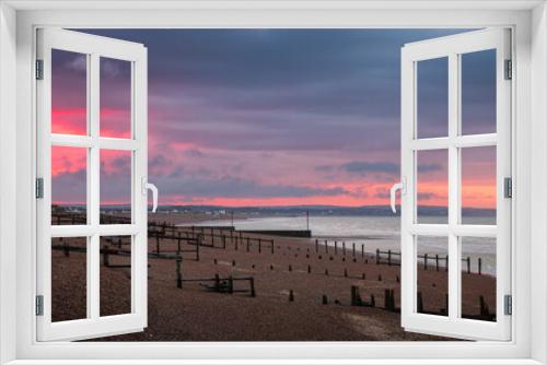 Fototapeta Naklejka Na Ścianę Okno 3D - Moody sunrise from the coast at Pevensey bay east Sussex south east England UK