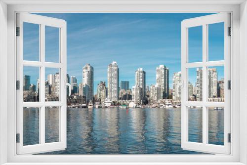 Fototapeta Naklejka Na Ścianę Okno 3D - Panorama View of Cityscape Downtown Vancouver from Charleson Park. Nice weather, Downtown buildings, False Creek can be seen in an image.