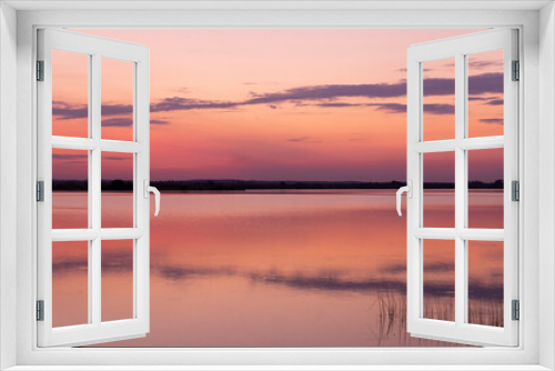 Fototapeta Naklejka Na Ścianę Okno 3D - multicolored sky during sunset on the lake