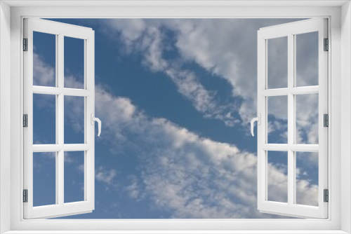 Streaks of delicate clouds in an incredibly beautiful blue sky